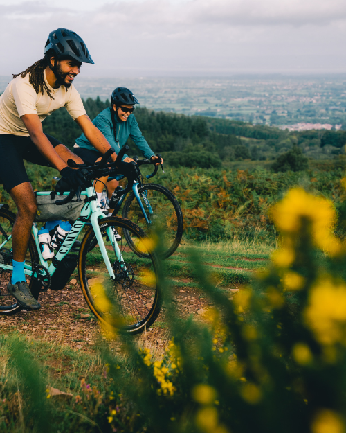Cyclists riding in sunny weather wearing Endura AllTrack Ride kit