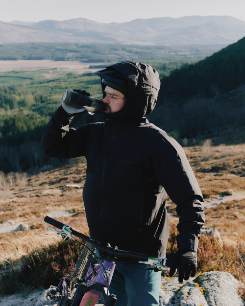 Three people cycling in the mountains